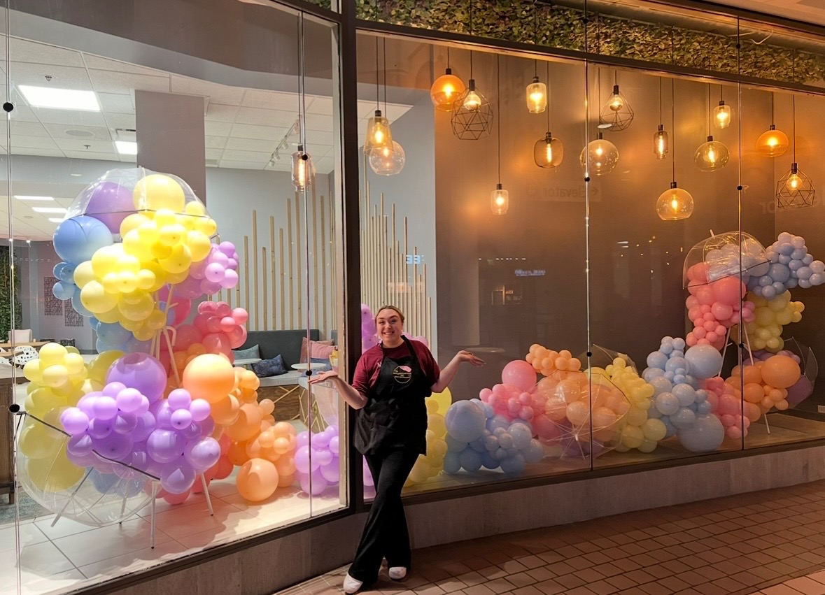 Mall storefront garland — pastel install at Heart boutique